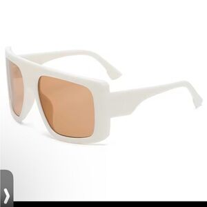 Chic Creme Sunglasses with Tan Lenses
0355